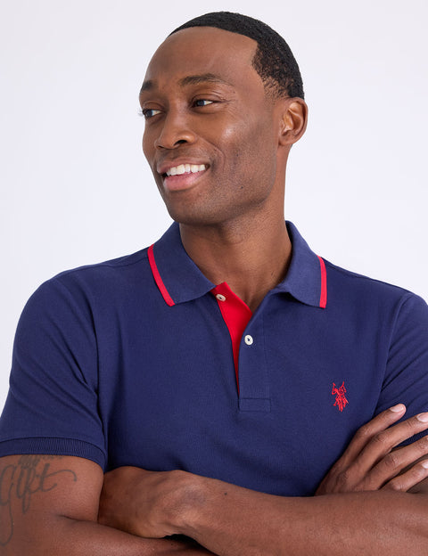 SLIM FIT STRETCH SOLID PIQUE POLO SHIRT - U.S. Polo Assn.