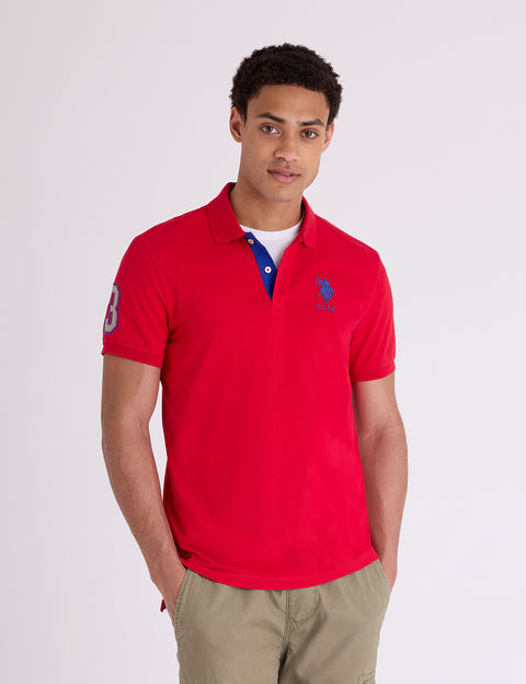 SLIM FIT STRETCH SOLID POLO SHIRT - U.S. Polo Assn.