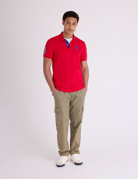 SLIM FIT STRETCH SOLID POLO SHIRT - U.S. Polo Assn.