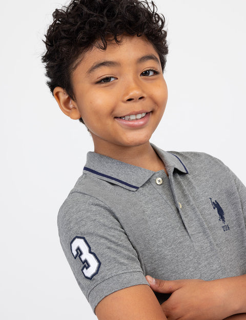BOYS SOLID PIQUE POLO SHIRT - U.S. Polo Assn.